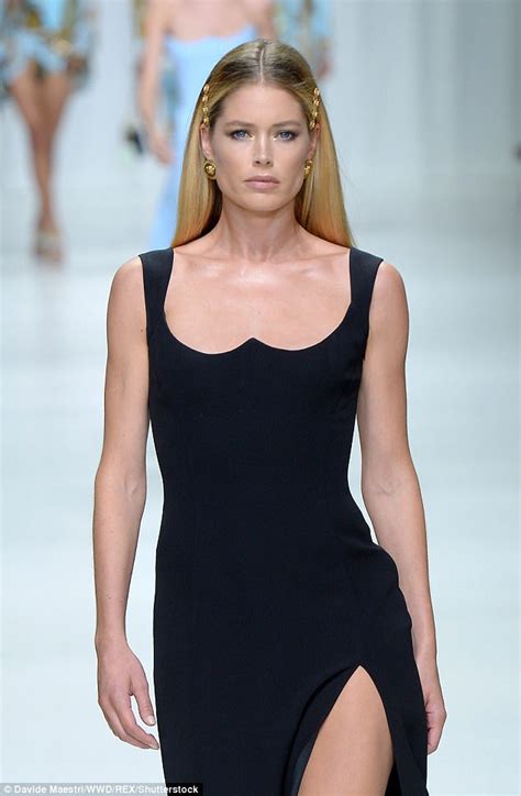 Doutzen Kroes storms Versace catwalk during MFW 